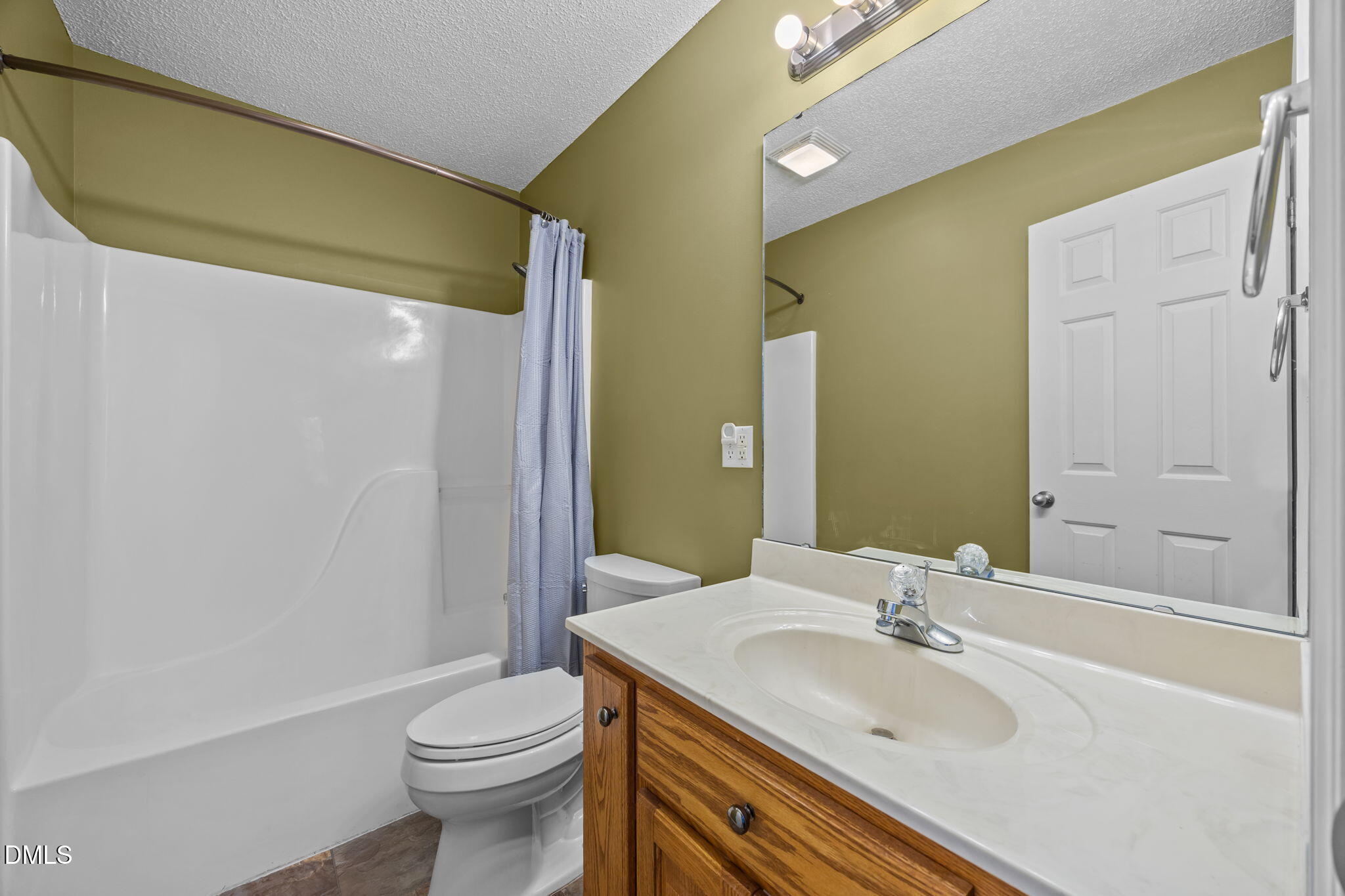 2267 South Jim Minor Road Haw River, NC 27258 - Photo 11 of 36 a bathroom with a sink toilet and shower