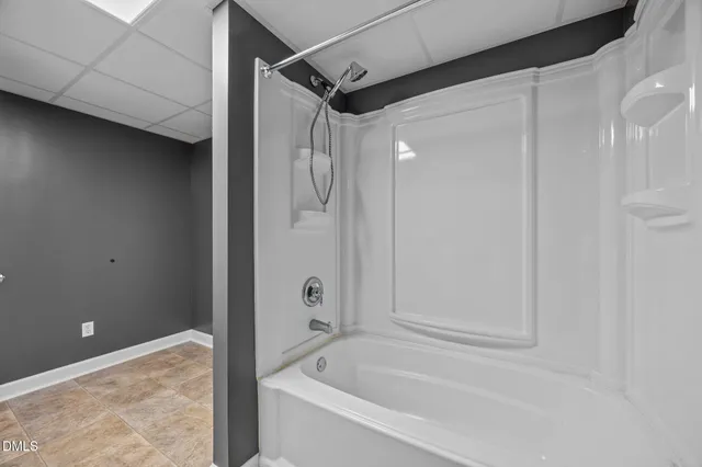 a view of balcony with wooden floor and fence and trees