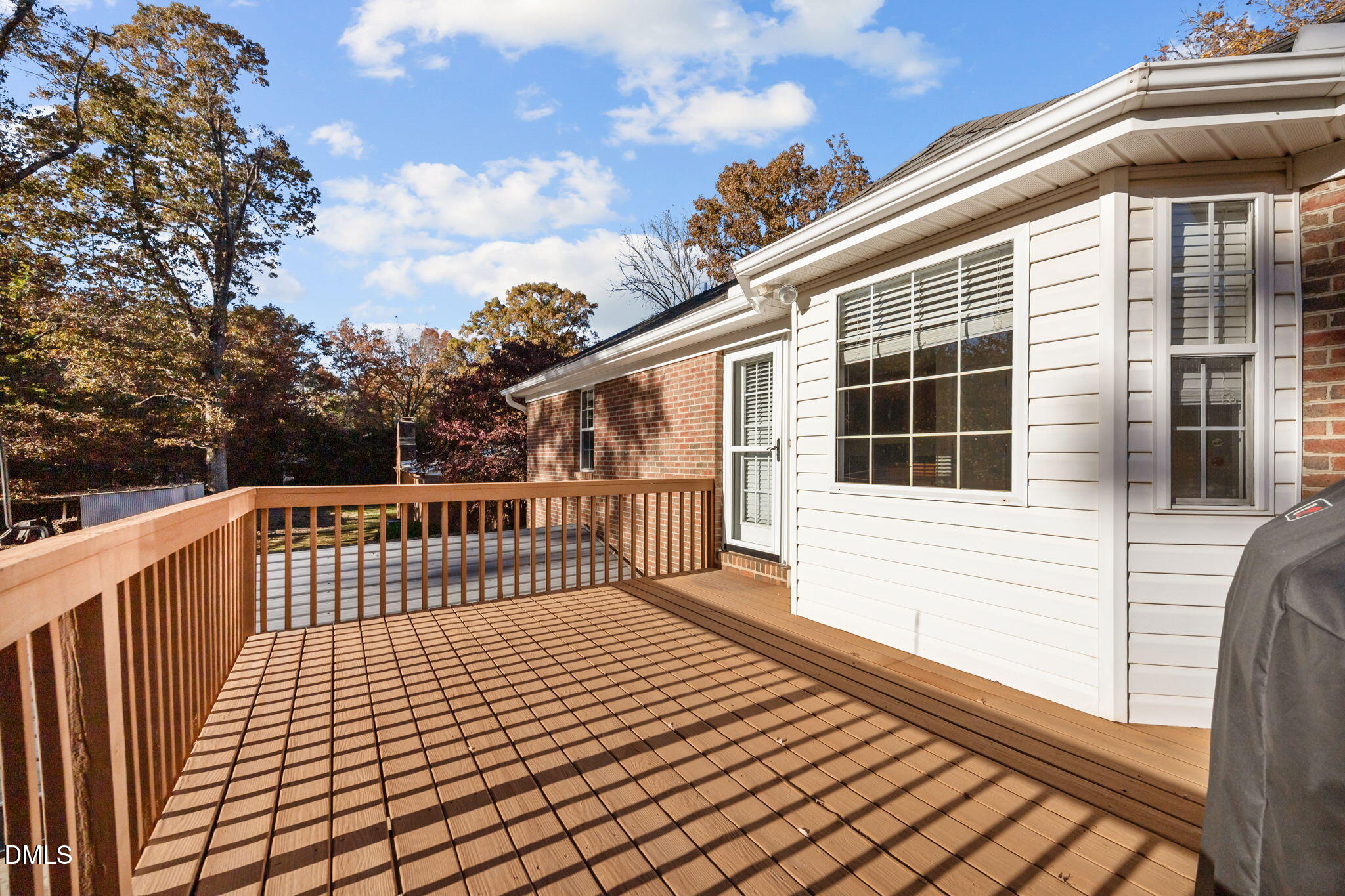 2267 South Jim Minor Road Haw River, NC 27258 - Photo 33 of 36 a view of a house with wooden deck