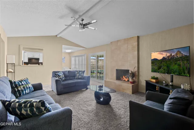 a bedroom with a bed and a fireplace