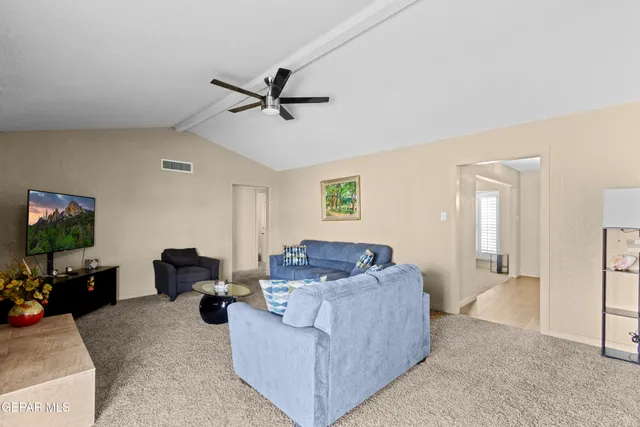 a bedroom with a bed and a fireplace