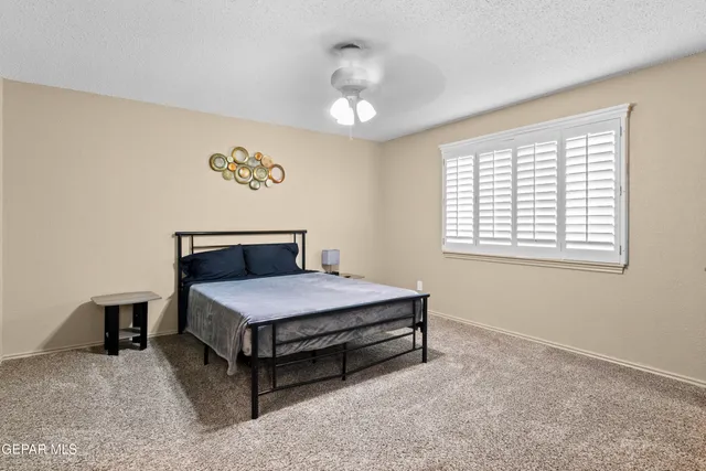 an aerial view of a house with lake view