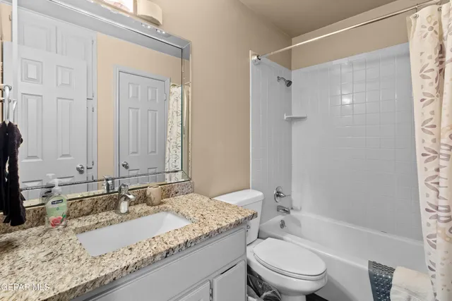 an aerial view of a house with a space