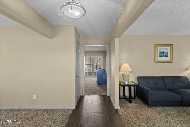 a living room with furniture and a couch