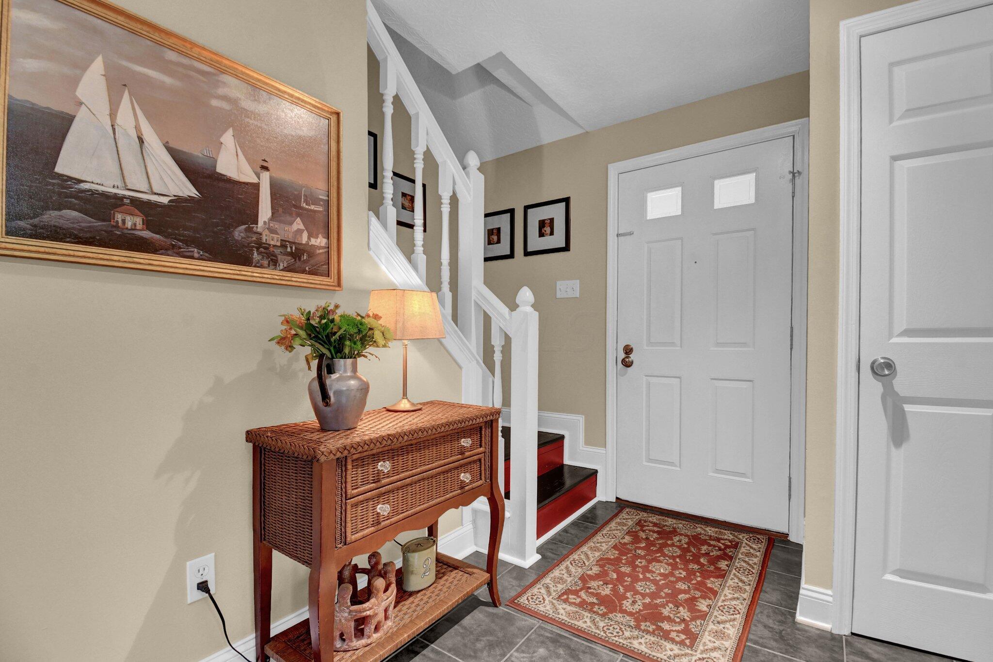 168 Ravine Ridge Drive South Powell, OH 43065 - Photo 6 of 35 Foyer with half bath
