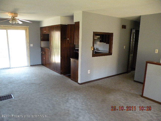 2136 Ross Road Dalton, PA 18414 - Photo 3 of 9 a view of a hallway to rooms
