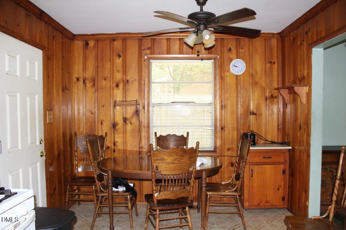 5109 Kaplan Drive Raleigh, NC 27606 - Photo 6 of 13 a view of a dining room with furniture and window