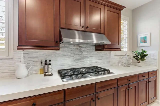 a bedroom with a bed and a fireplace