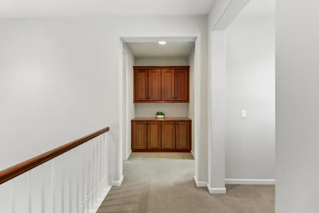 a bathroom with a sink vanity and a mirror