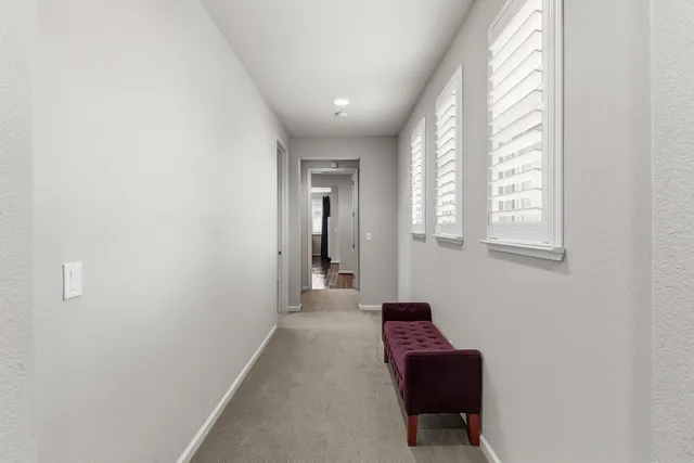 a view of a chairs and table in the patio