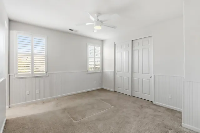 a view of a dinning table and chairs in the patio