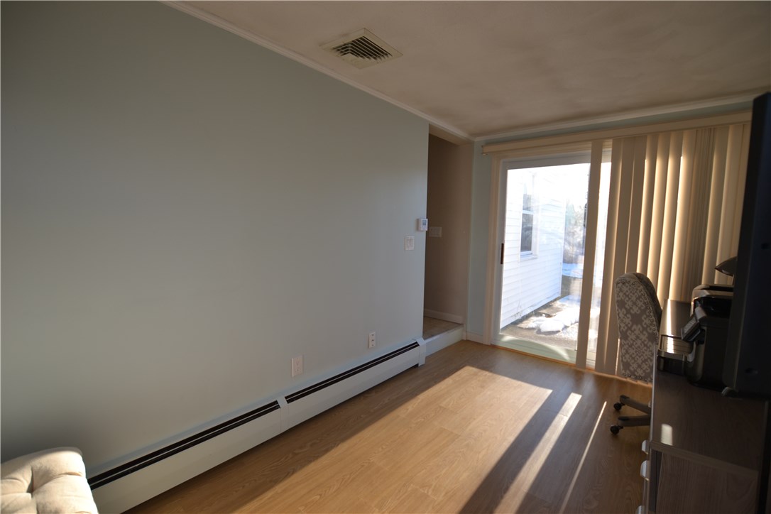 11 Fielding Road Cranston, RI 02910 - Photo 20 of 32 Breezeway/Office With Slider to Patio and Backyard