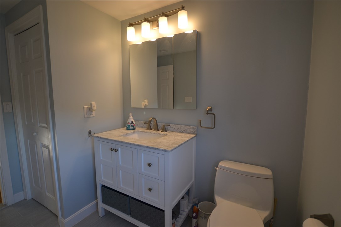 11 Fielding Road Cranston, RI 02910 - Photo 21 of 32 Newly Renovated Full Bath with Tile Shower Surround and Tub