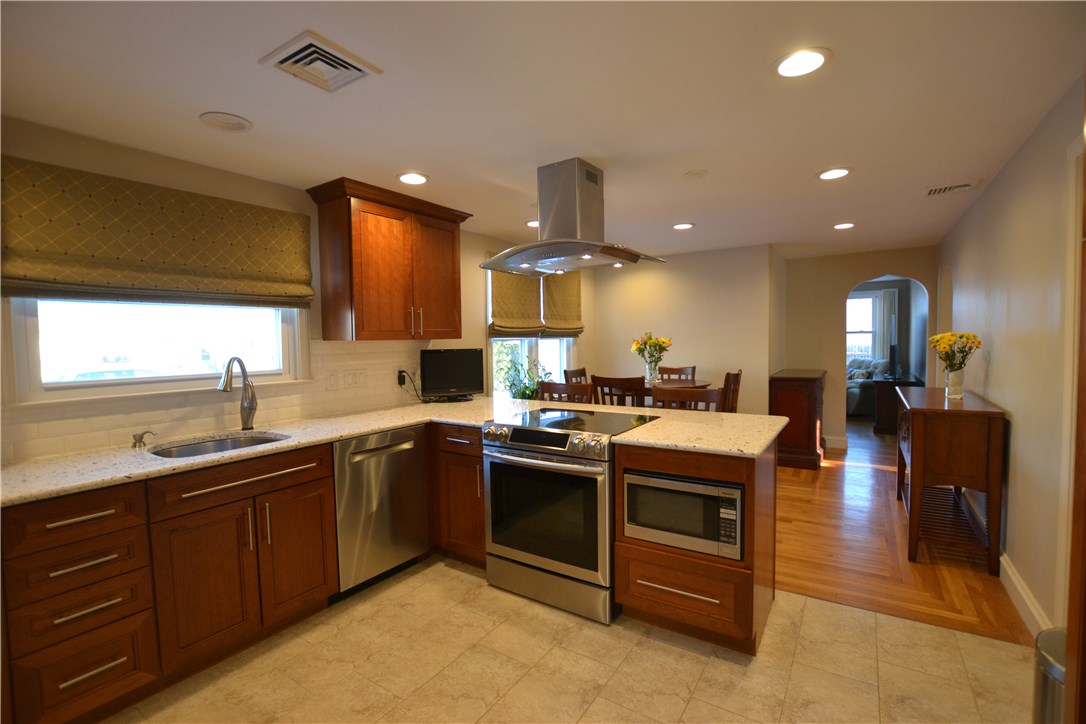11 Fielding Road Cranston, RI 02910 - Photo 4 of 32 Spacious Custom Kitchen with Quartz Counters, SS Appliances, Garbage Disposal and More