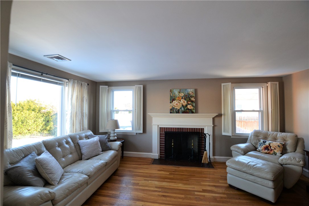 11 Fielding Road Cranston, RI 02910 - Photo 10 of 32 Warm & Inviting Living Room with Brick Fireplace