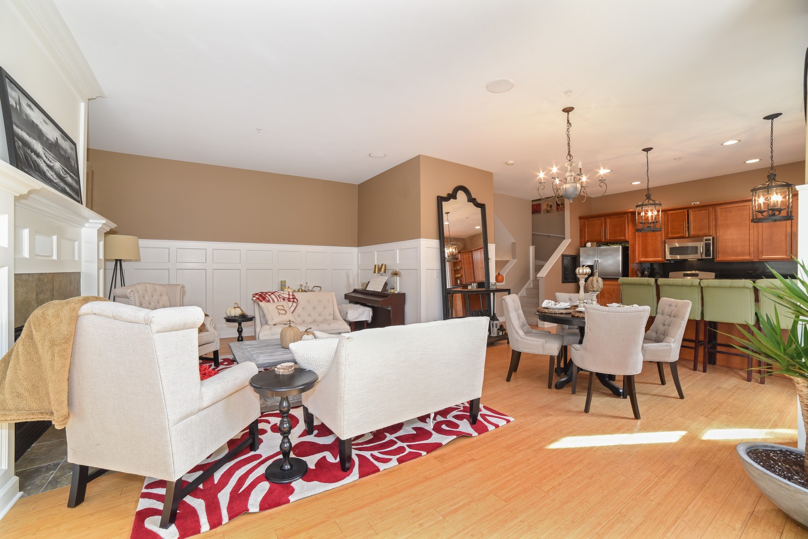 155 Dawson Drive Elgin, IL 60120 - Photo 4 of 13 a living room with furniture and a chandelier