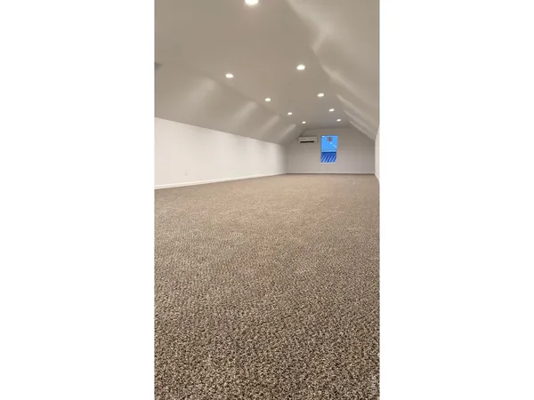 a view of a hallway with floor