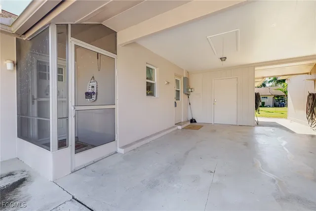 a view of a hallway with wooden shelves