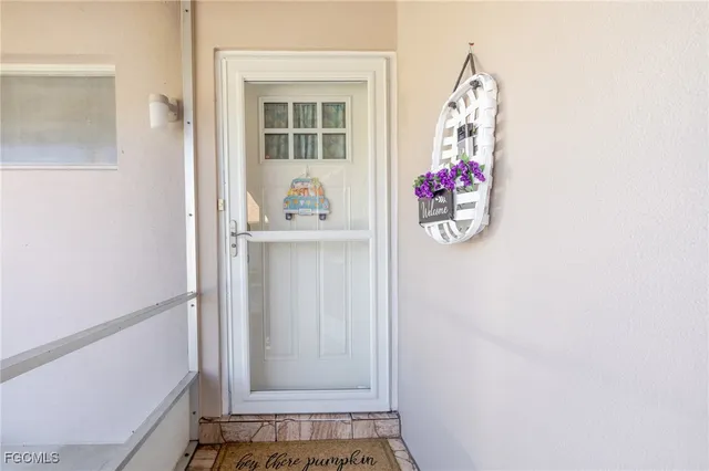 a room with a door and a window