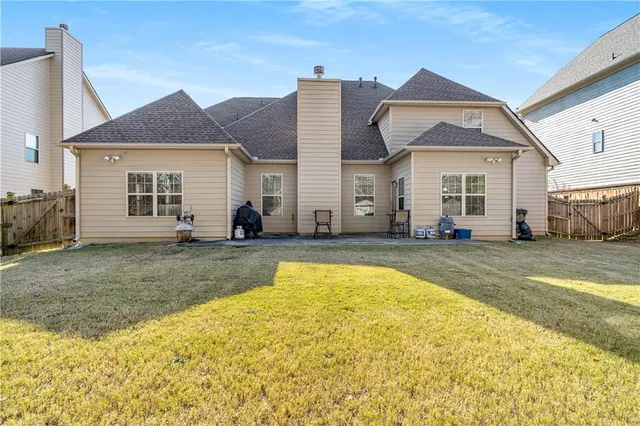 a view of a house with a swimming pool