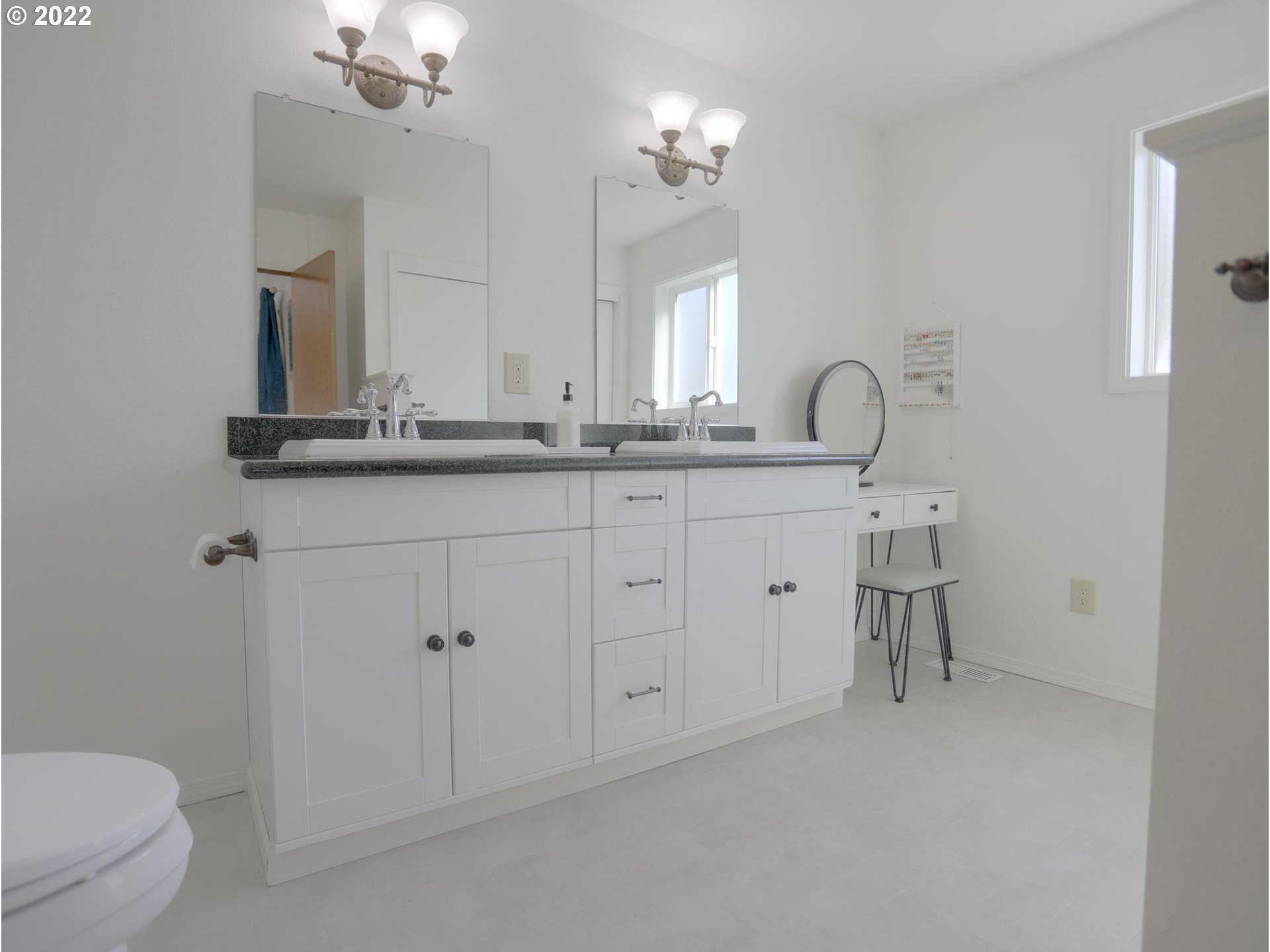 43370 Southeast Pagh Road Sandy, OR 97055 - Photo 15 of 29 a bathroom with double sink and a mirror