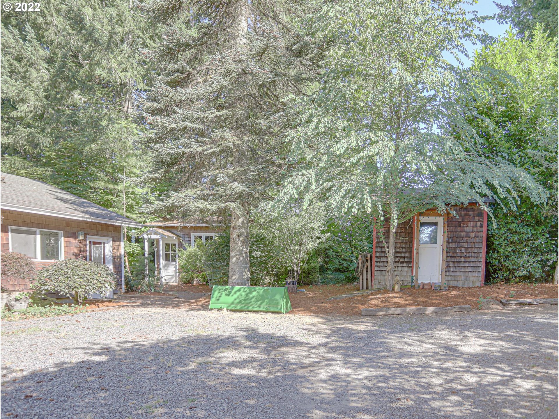 43370 Southeast Pagh Road Sandy, OR 97055 - Photo 24 of 29 a view of a house with a tree in front of it