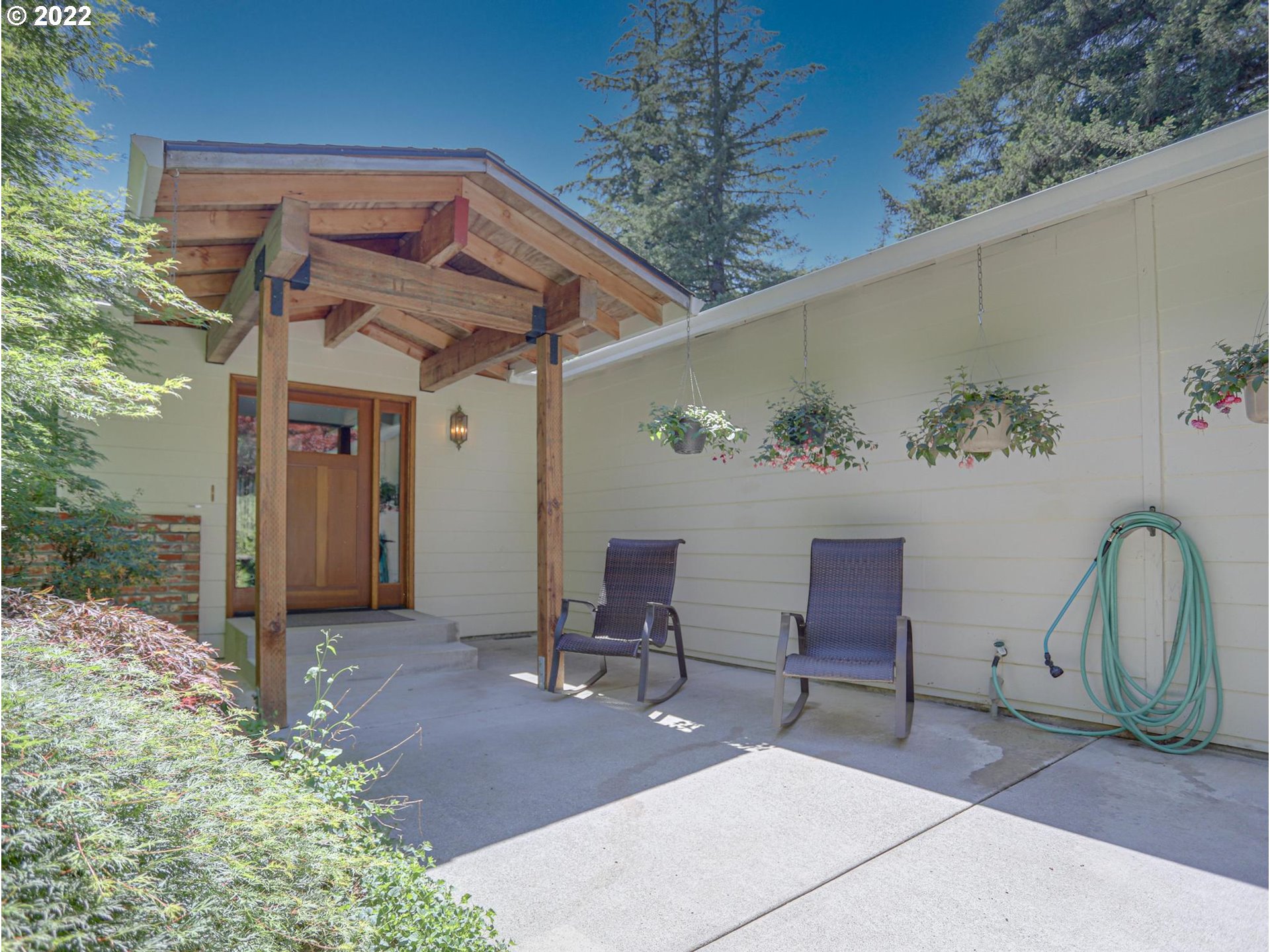 43370 Southeast Pagh Road Sandy, OR 97055 - Photo 3 of 29 a view of entryway with a flower garden