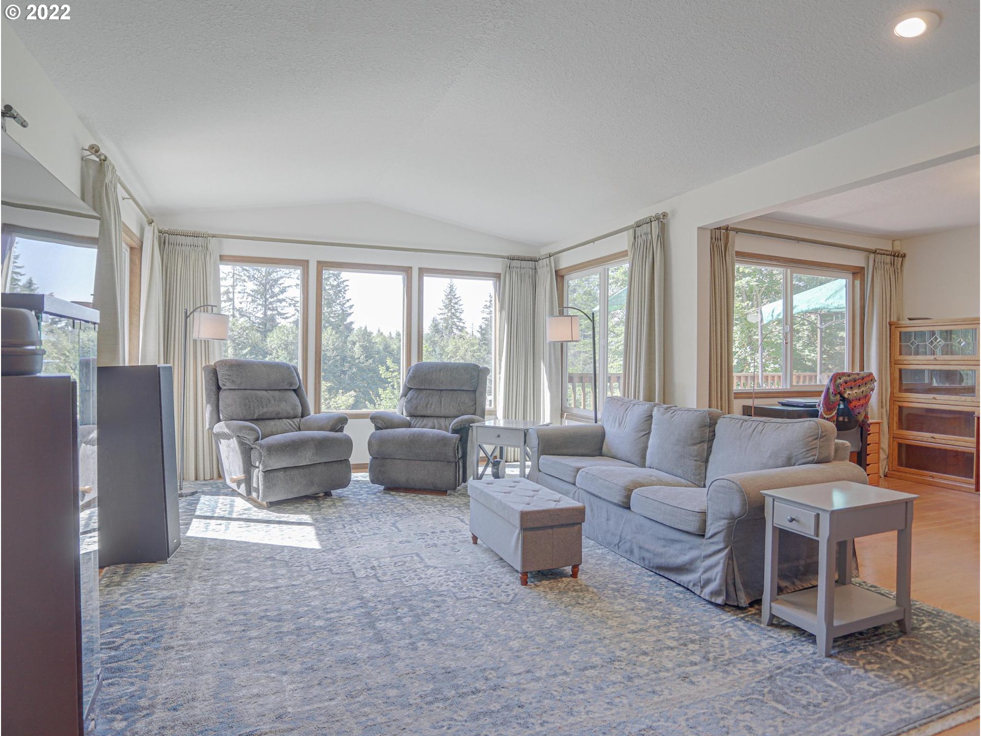 43370 Southeast Pagh Road Sandy, OR 97055 - Photo 10 of 29 a living room with furniture and a large window