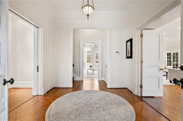 a bedroom with a bed and closet with mirror