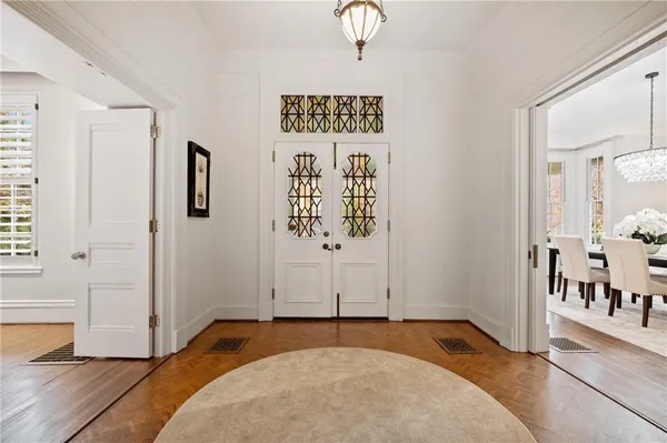 a view of livingroom with hardwood floor and hallway