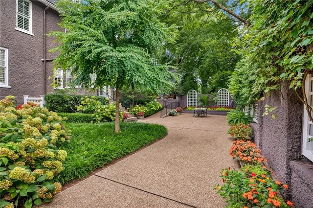 a backyard of a house with lots of green space