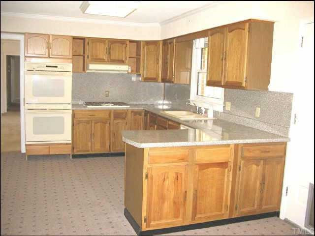 4113 Weaver Drive Raleigh, NC 27612 - Photo 2 of 8 Charming Eat-In Kitchen with gas cooktop and double ovens Other