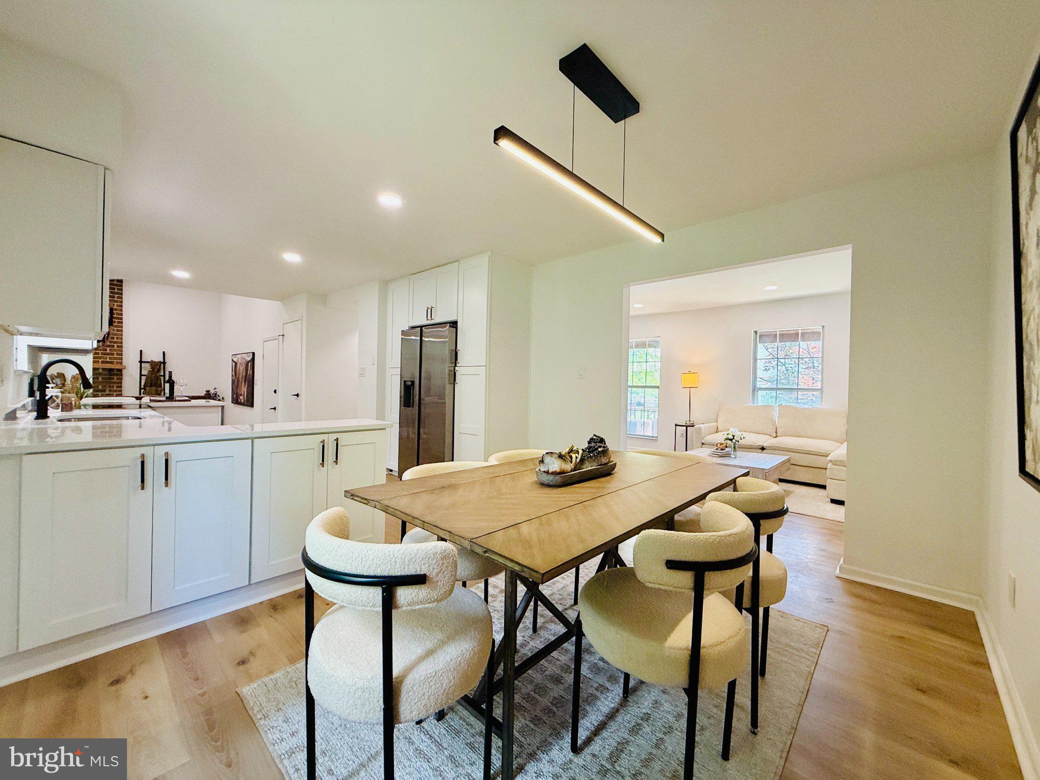 815 Whitehall Street Silver Spring, MD 20901 - Photo 8 of 39 Modern dining space with natural light.