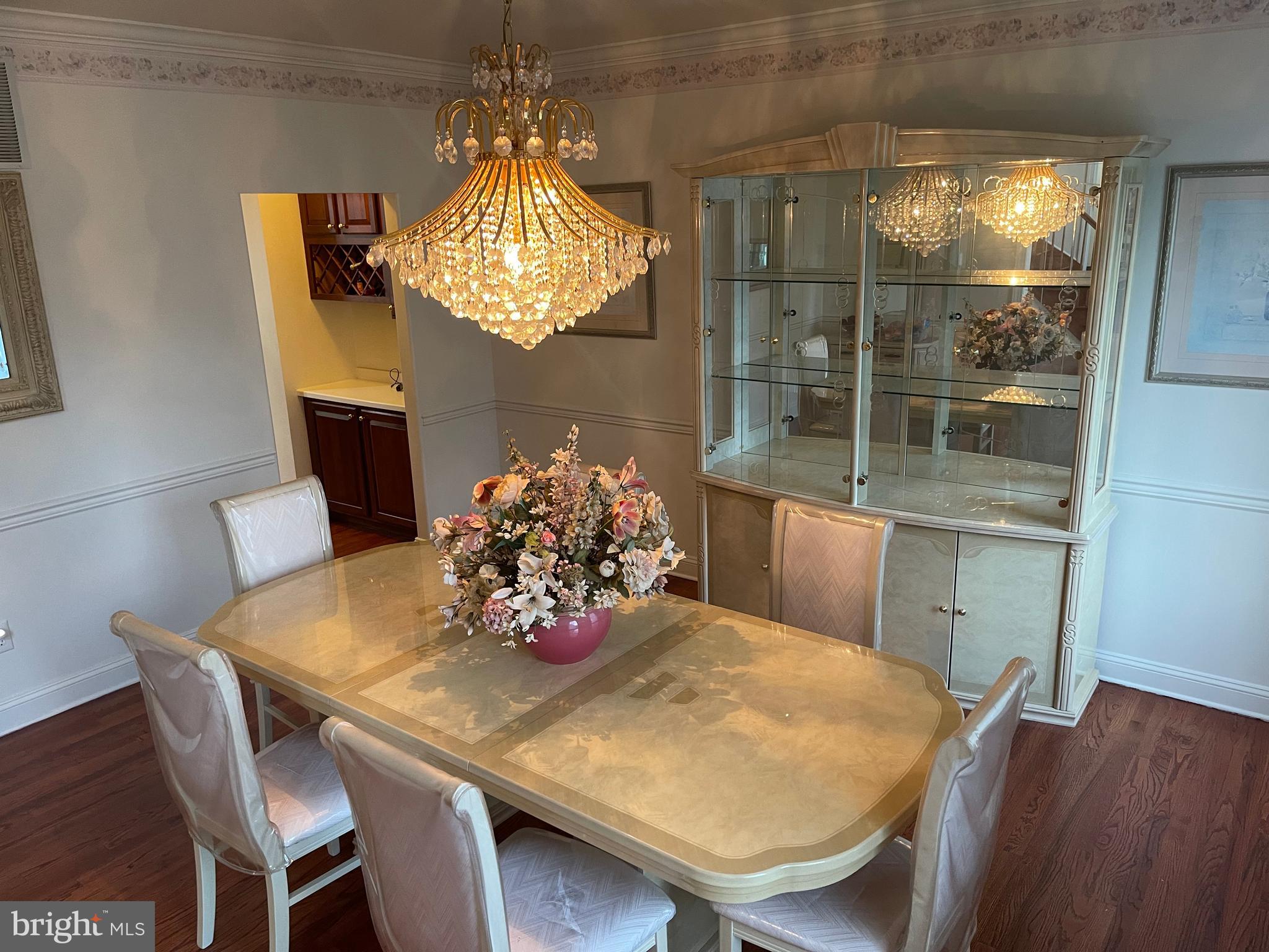 18 Jewel Road Princeton Junction, NJ 08550 - Photo 14 of 66 a view of a dining room with furniture and wooden floor