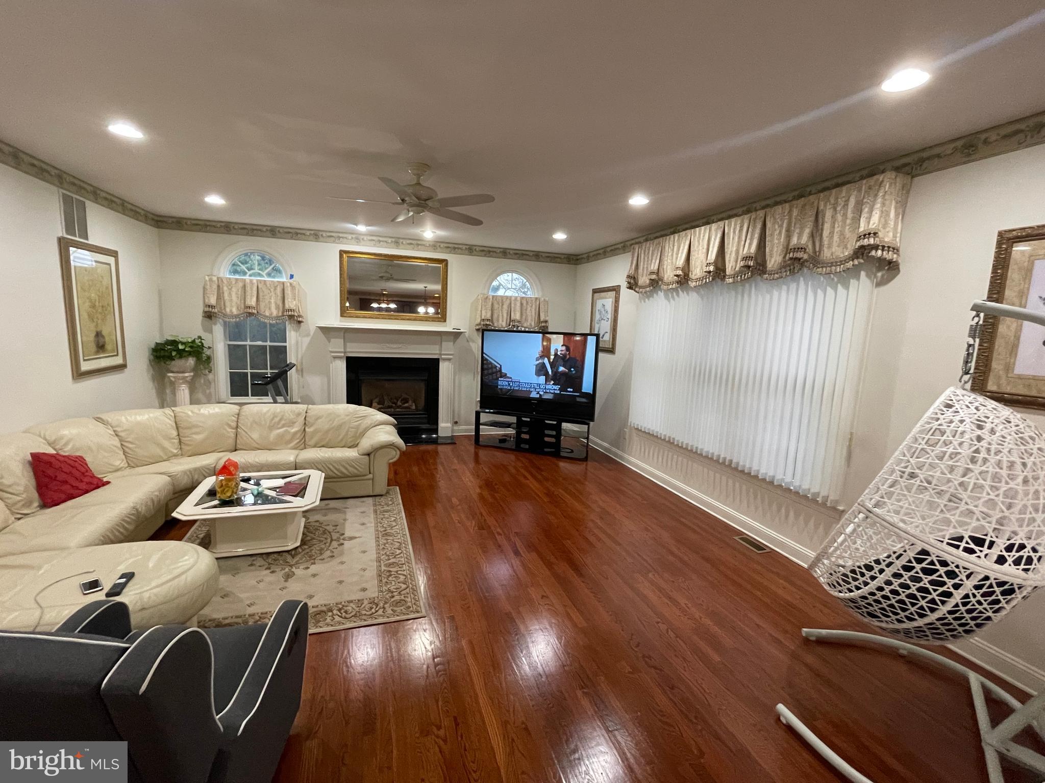 18 Jewel Road Princeton Junction, NJ 08550 - Photo 21 of 66 a living room with furniture and a fireplace