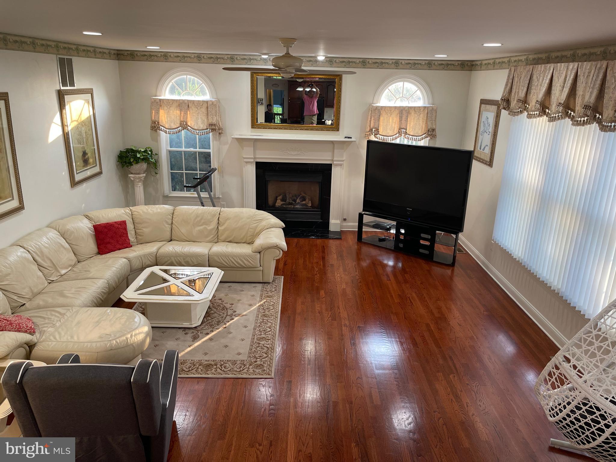 18 Jewel Road Princeton Junction, NJ 08550 - Photo 22 of 66 a living room with furniture and a flat screen tv