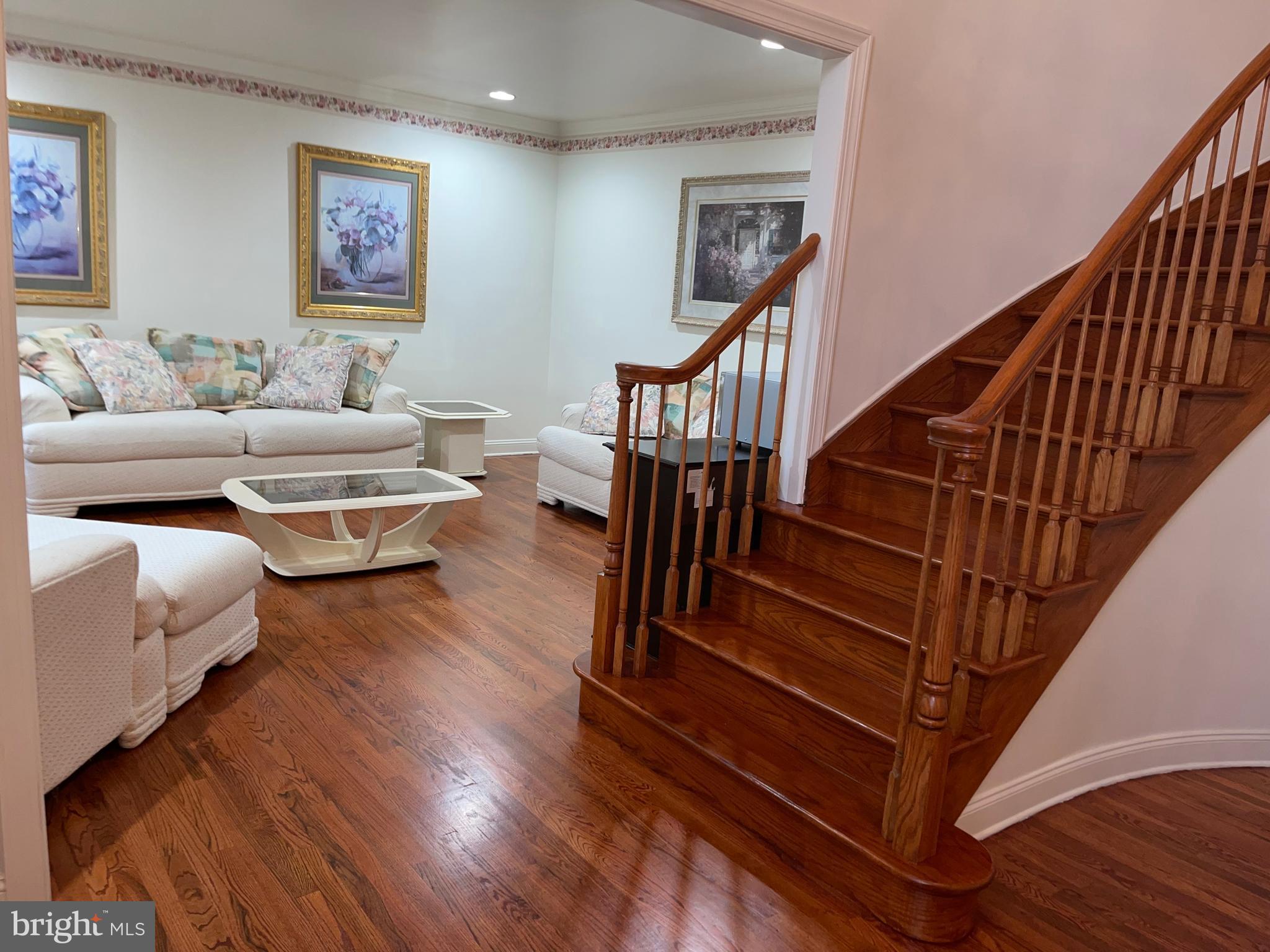 18 Jewel Road Princeton Junction, NJ 08550 - Photo 4 of 66 a living room with furniture and a wooden floor