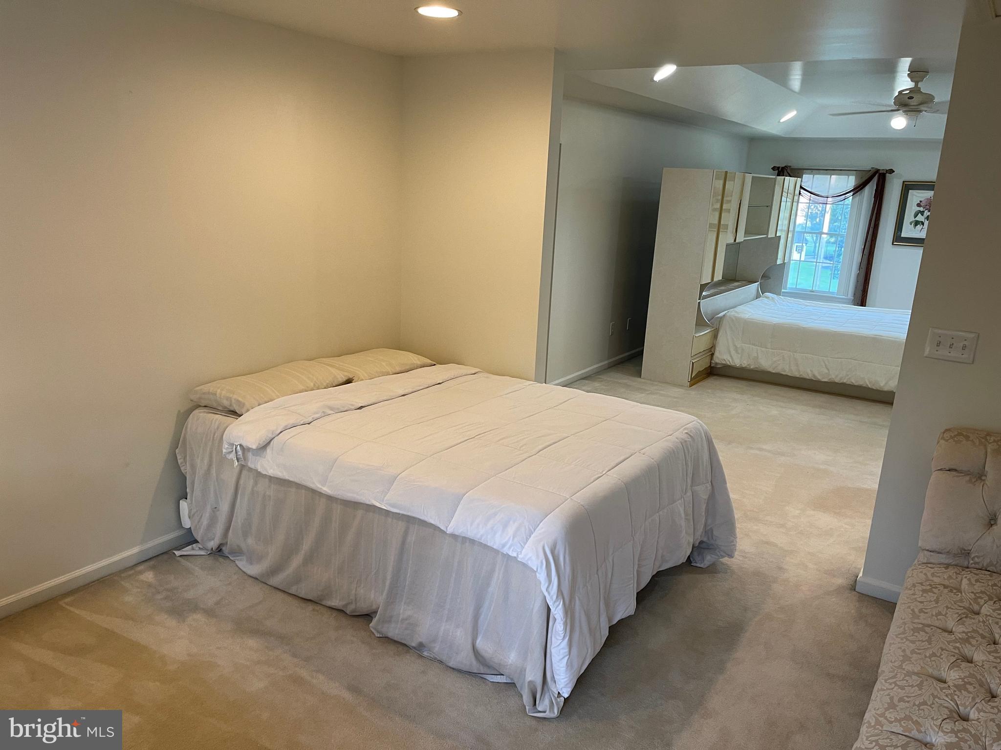 18 Jewel Road Princeton Junction, NJ 08550 - Photo 38 of 66 a spacious bedroom with a bed and a couch
