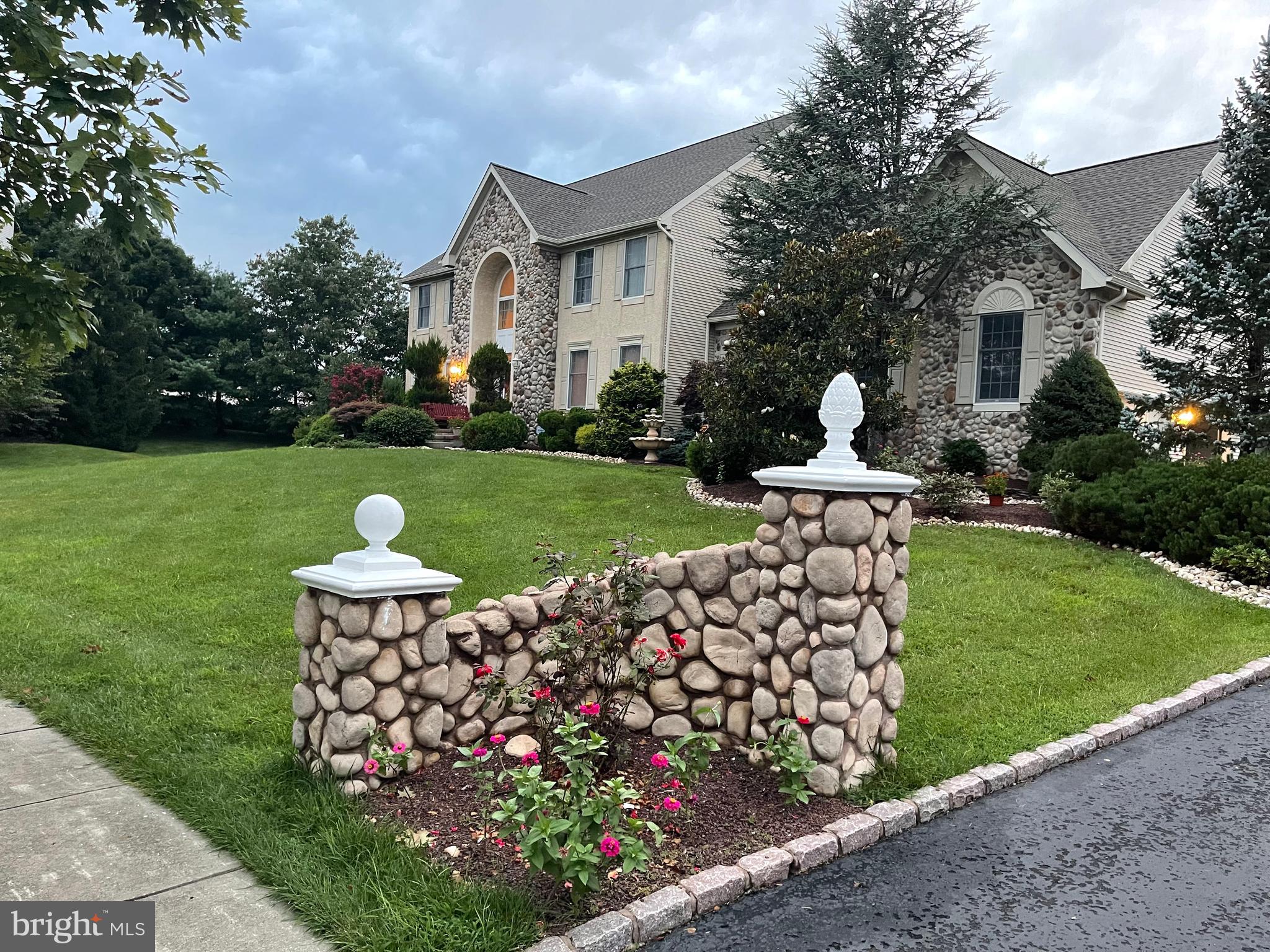 18 Jewel Road Princeton Junction, NJ 08550 - Photo 64 of 66 a front view of a house with garden
