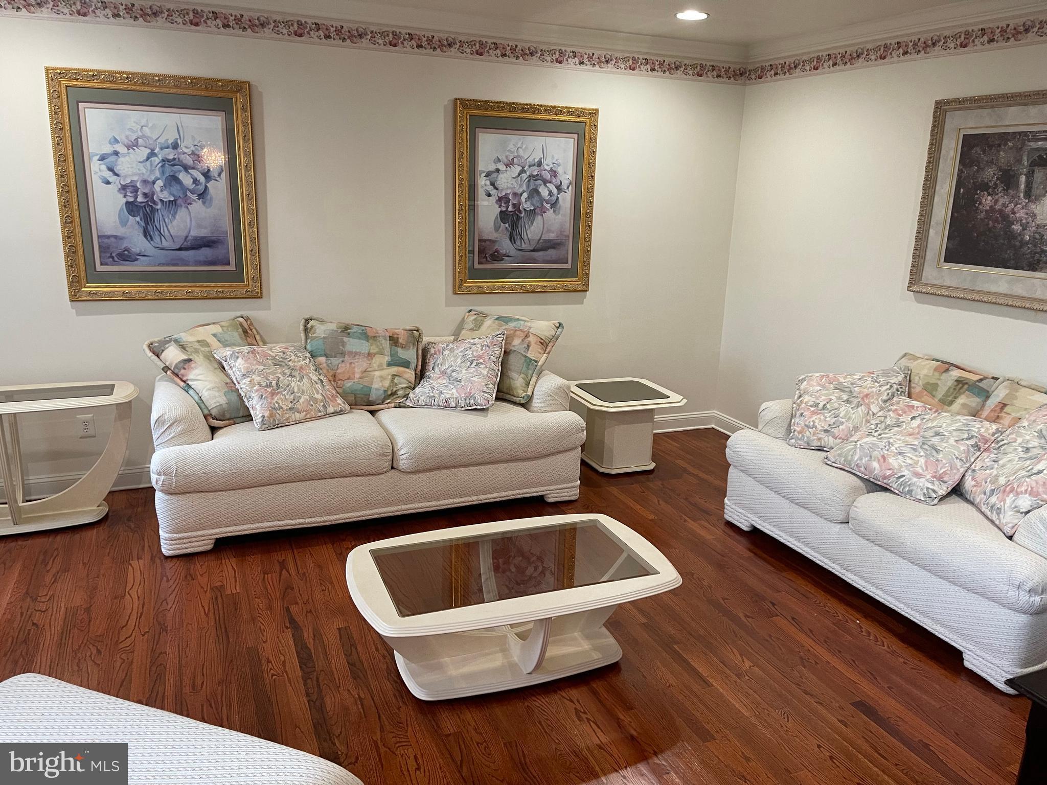 18 Jewel Road Princeton Junction, NJ 08550 - Photo 9 of 66 a living room with furniture and a wooden floor