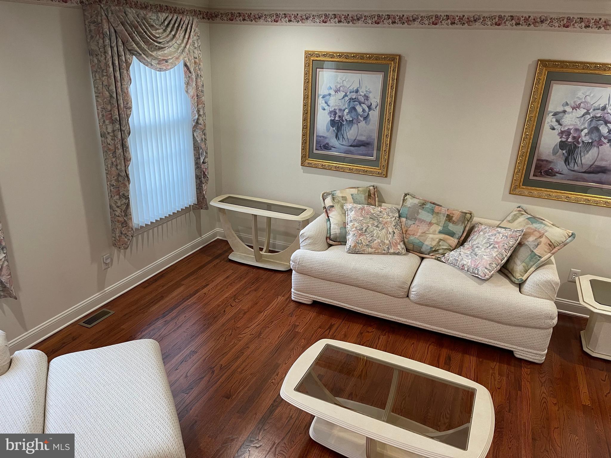 18 Jewel Road Princeton Junction, NJ 08550 - Photo 10 of 66 a living room with furniture and a wooden floor