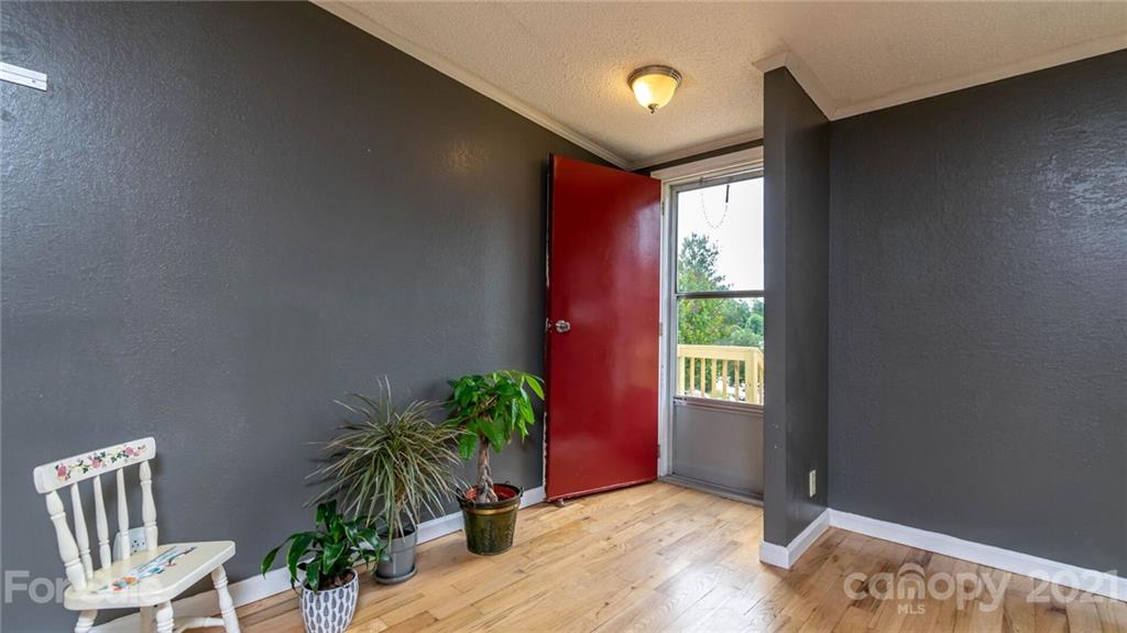 449 Divide Loop Flat Rock, NC 28731 - Photo 5 of 36 a view of an entryway with wooden floor