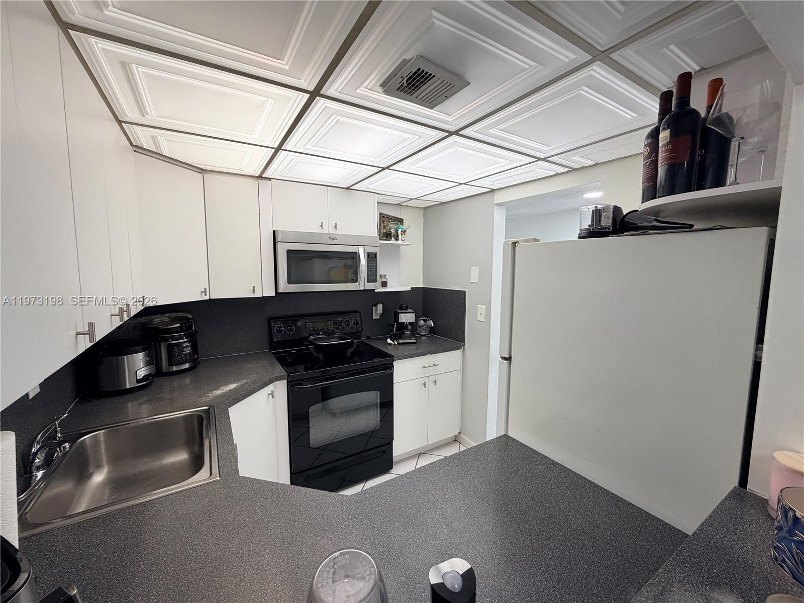 1825 West 44th Place, Unit 206 Hialeah, FL 33012 - Photo 9 of 16