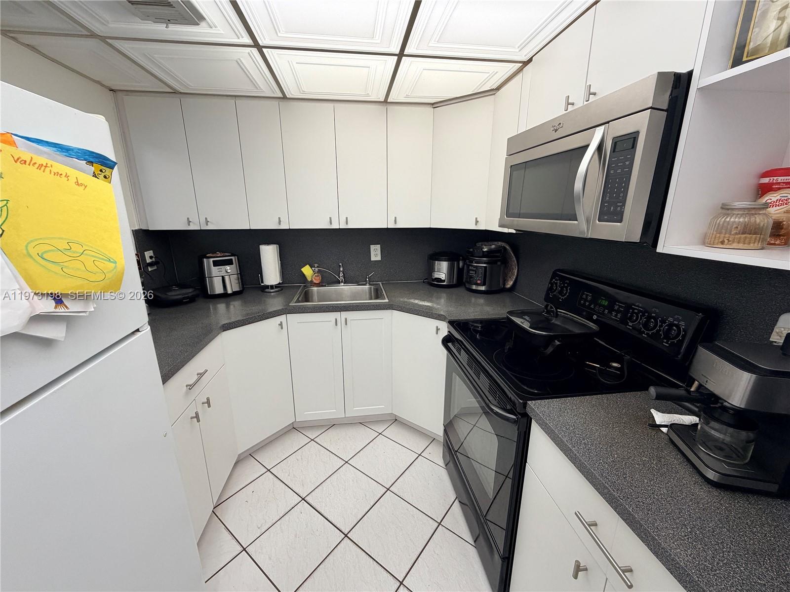 1825 West 44th Place, Unit 206 Hialeah, FL 33012 - Photo 10 of 16