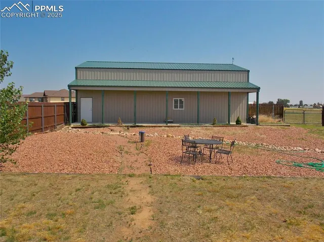 an empty room with an outdoor view and a window