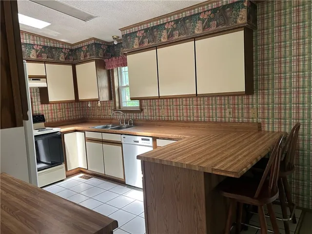 $310,000 | 34908 East Shores Road, Lone Jack, MO 64070