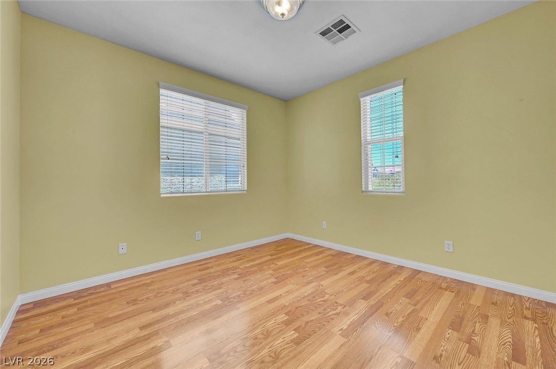 977 Sparkling Light Street Henderson, NV 89052 - Photo 50 of 75 This versatile space features gleaming hardwood floors and ample natural light, perfect for your personal touch.
