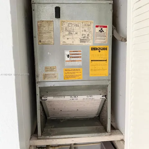 a white bath tub sitting next to a toilet