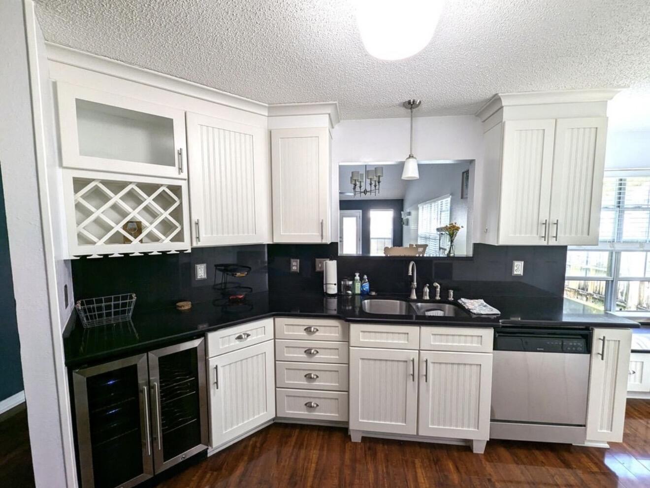 431 Sandy Ridge Circle Mary Esther, FL 32569 - Photo 14 of 16 a kitchen with white cabinets and sink