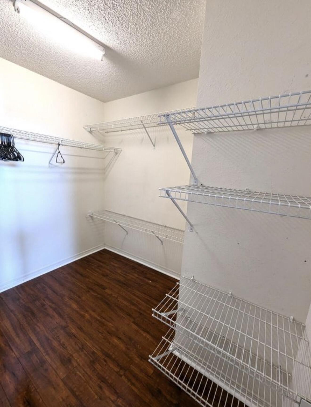 431 Sandy Ridge Circle Mary Esther, FL 32569 - Photo 7 of 16 a view of a room with racks on the wall